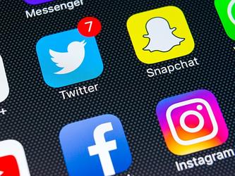 Mobile social media twitter snapchat_crop